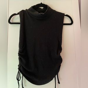 Low turtle neck black tank top with adjustable tie sides, size medium